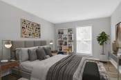 Thumbnail 15 of 16 - Affinitee at Stone Mountain Apartments photo of a bedroom with a large bed and a window