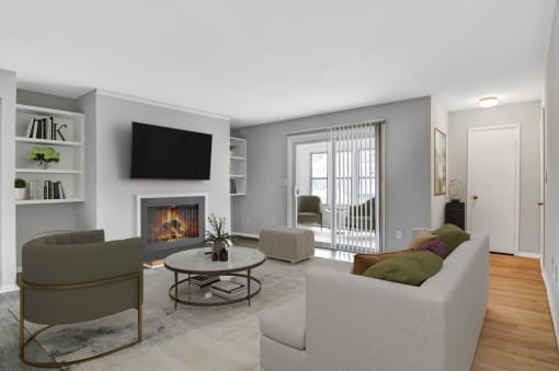 Affinitee at Stone Mountain Apartments photo of a living room with a couch and a chair and a fireplace